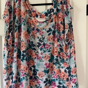 Torrid blouse, size 4. Silk, cute bow detail on back.